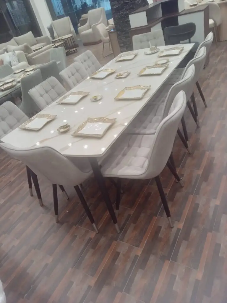 Elegant dining table with chairs.